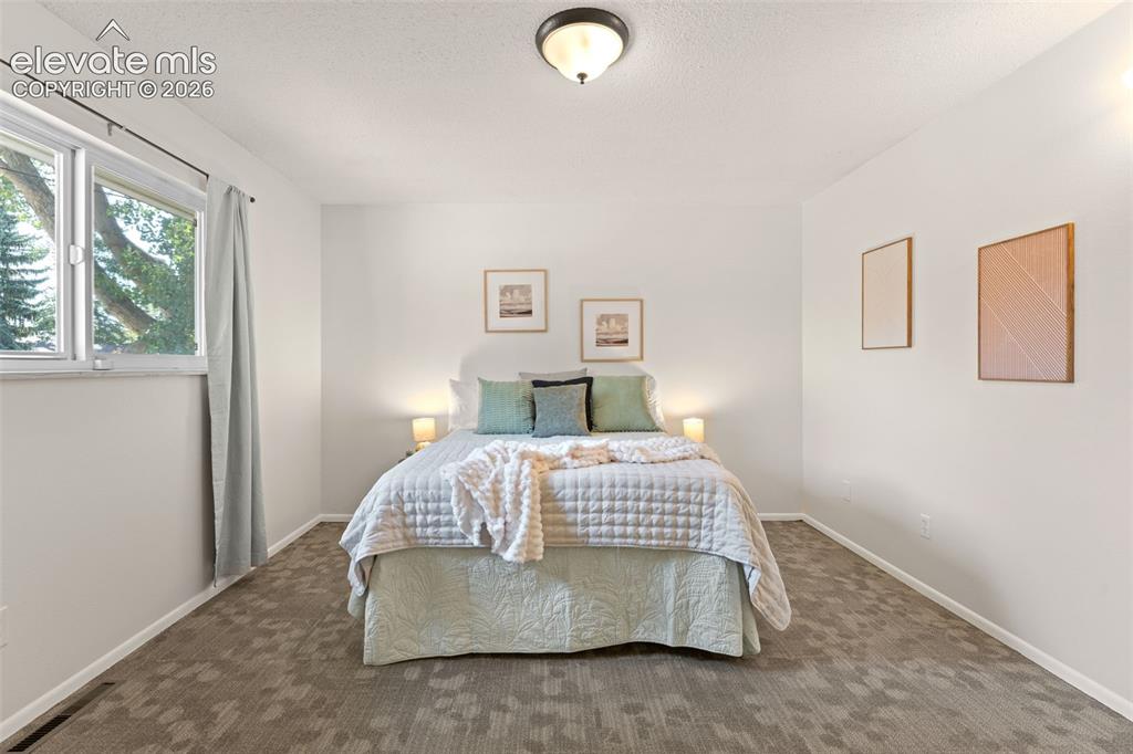 Image 17 of 49: Bedroom