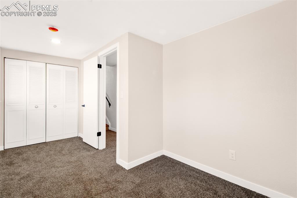 Image 27 of 45: Downstairs Bedroom