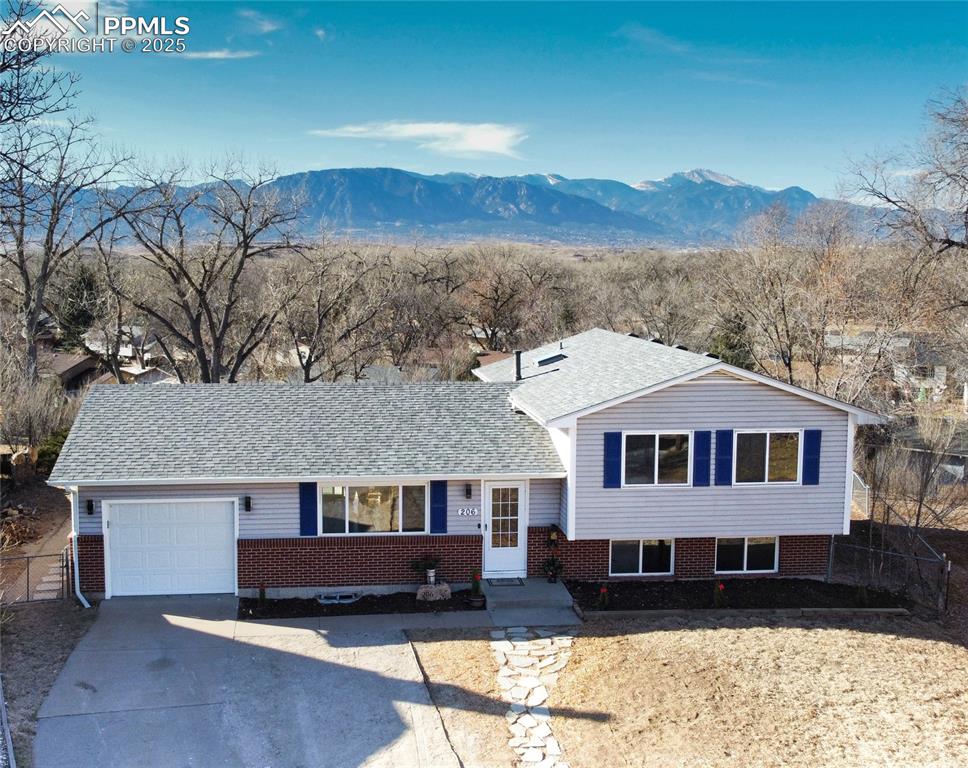 Image 39 of 45: Front with mountain range behind