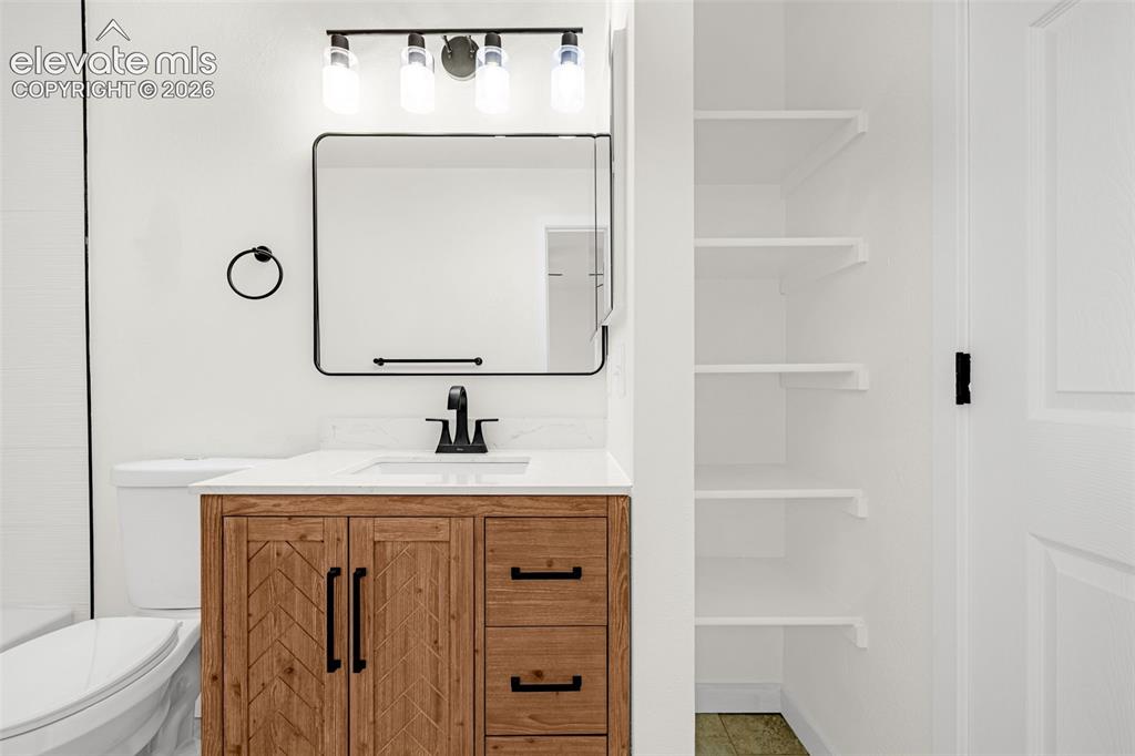 Image 17 of 48: Upper Level Bathroom. Attached to Primary Bedroom and has hall access.