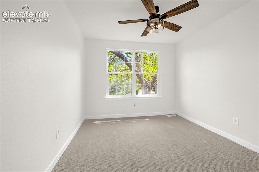 Image 21 of 48: Upper Level Bedroom