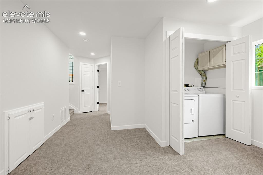 Image 26 of 48: Basement Family / Bonus Room & Laundry