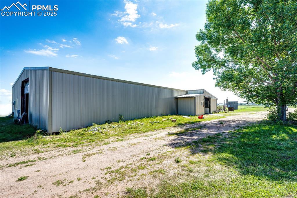 Image 40 of 42: Insulated shop with concrete floor.