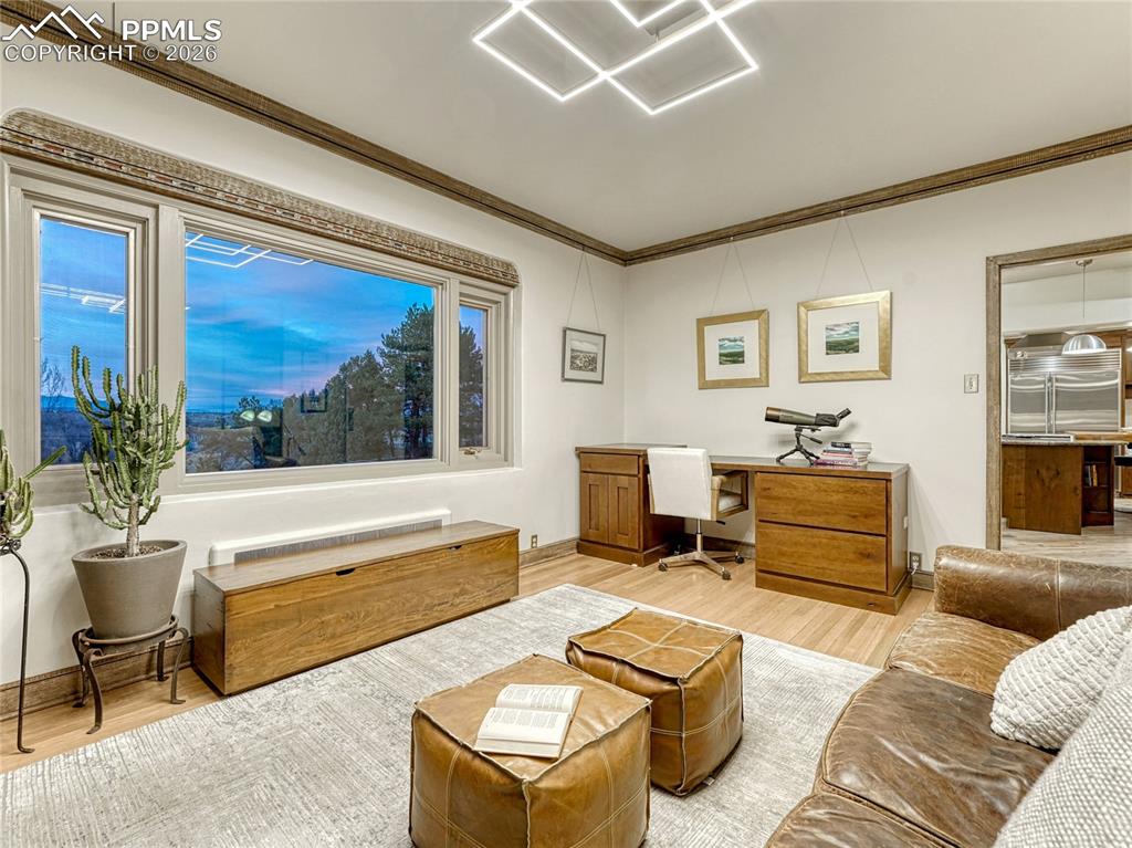 Image 21 of 50: WOLF range, custom wood seating area, original Vitrolite wall tile.