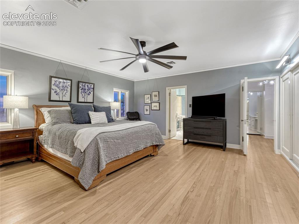 Image 25 of 50: Original hardwood flooring throughout.