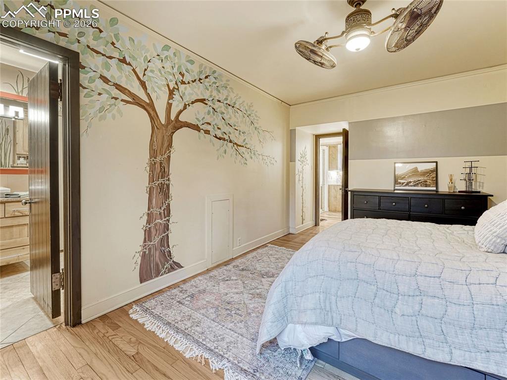 Image 30 of 50: Primary Suite w/dual closets, window seat, dressing area w/additional wardr