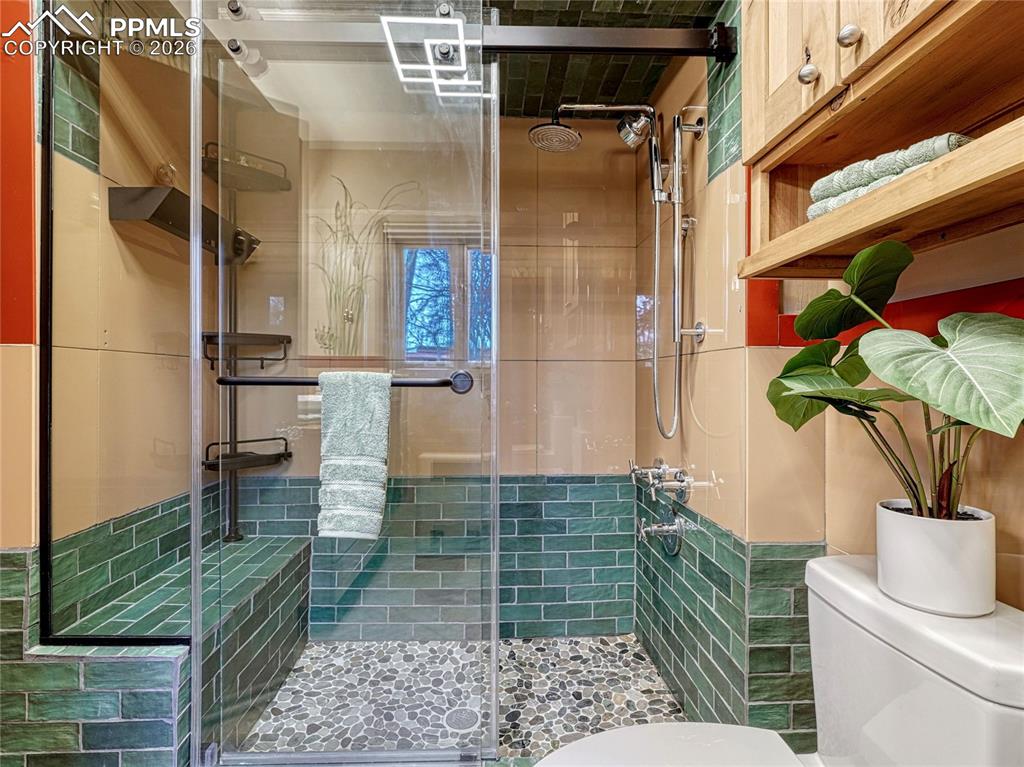 Image 32 of 50: Original handpainted and Vitrolite tile.