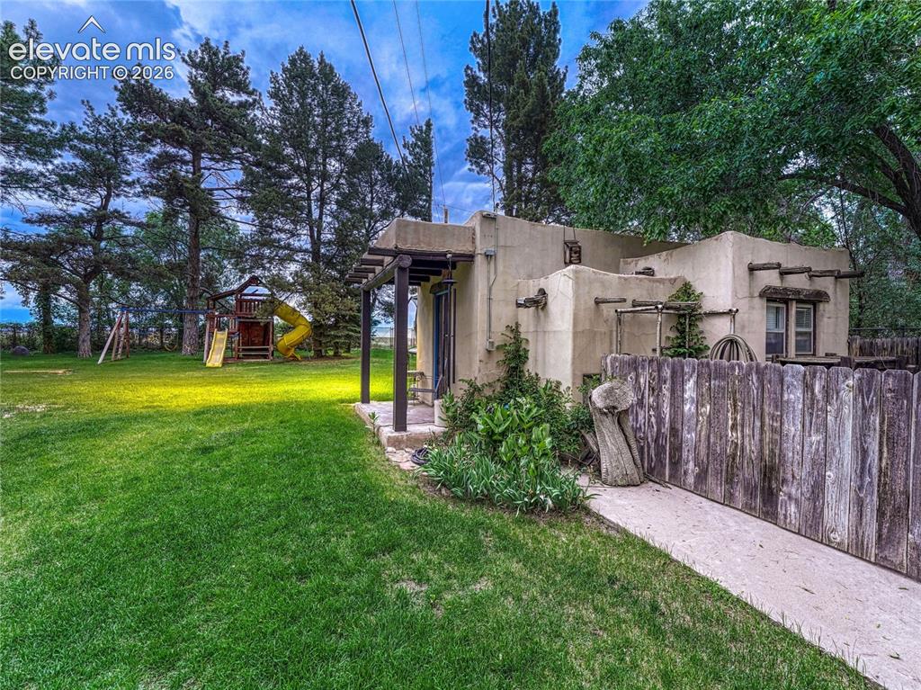 Image 44 of 50: Expansive lawn/playfield for recreation and gatherings