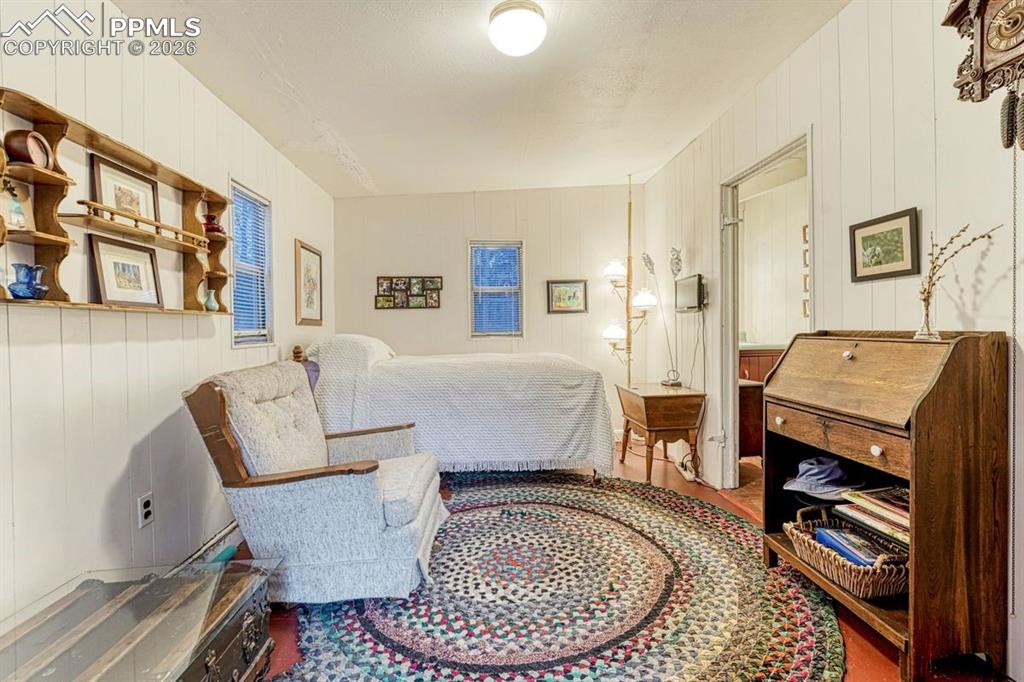 Image 46 of 50: Draped in green-leaf vines over the summer months.