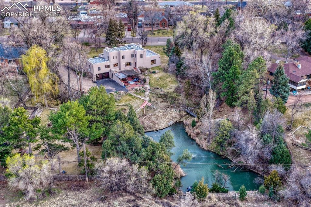 Image 47 of 50: Two natural ground springs (with water rights) feed into the Koi pond.