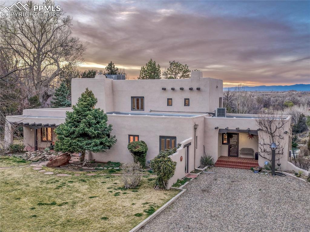 Image 9 of 50: Primary Suite has window seat, double closets with built-ins, additional dr