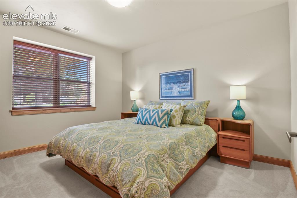 Image 31 of 48: Garden level basement bedroom