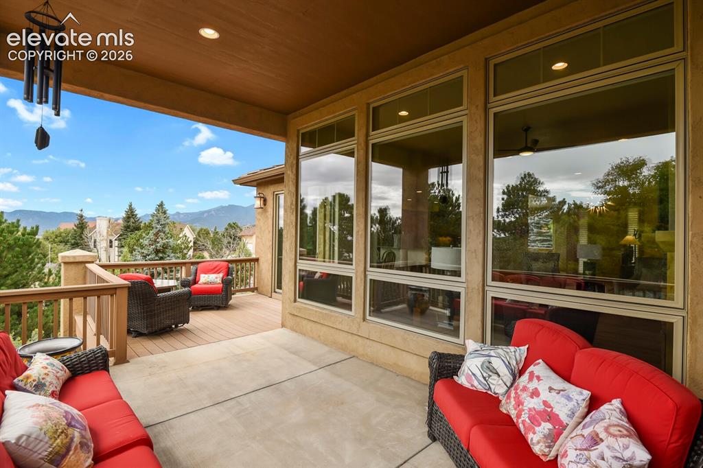 Image 36 of 48: Expansive deck/patio with mountain/city views.