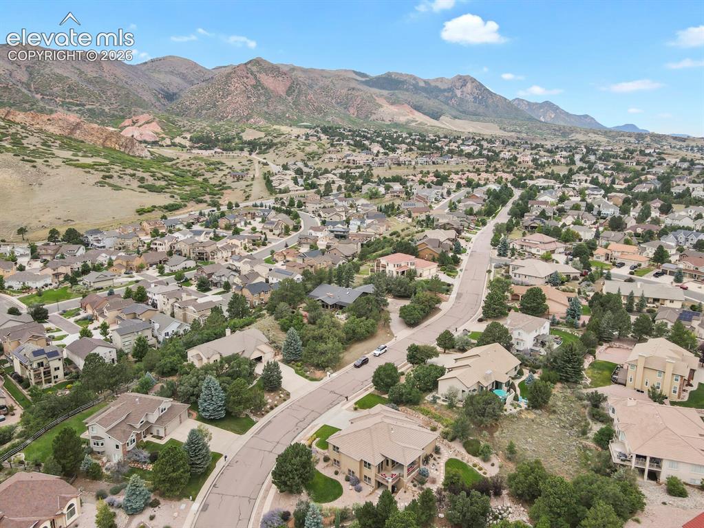 Image 44 of 48: Beautiful Mountain Shadows neighborhood with mountain and city views.