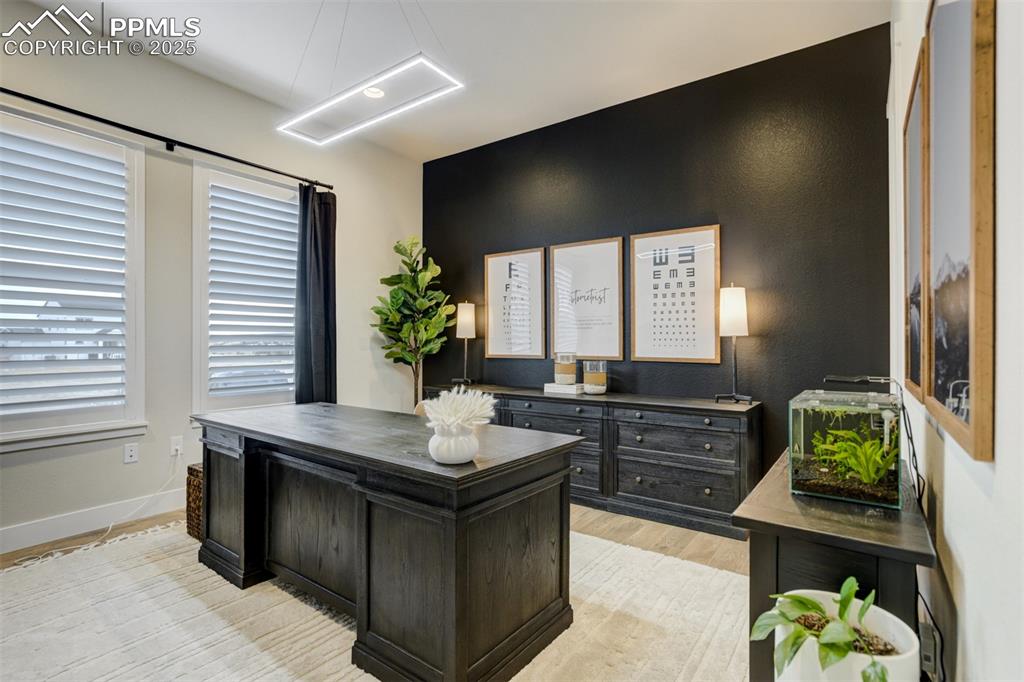 Image 23 of 47: Bedroom # 2 currently serving as a home office