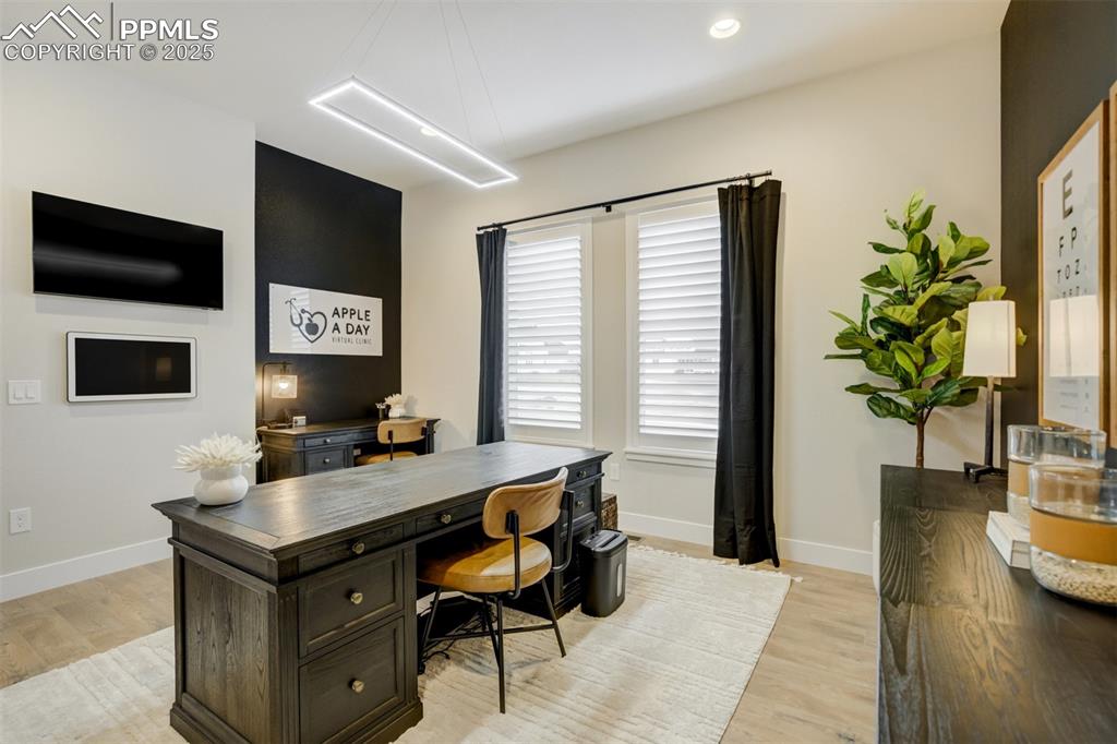 Image 24 of 47: Bedroom # 2 currently serving as a home office