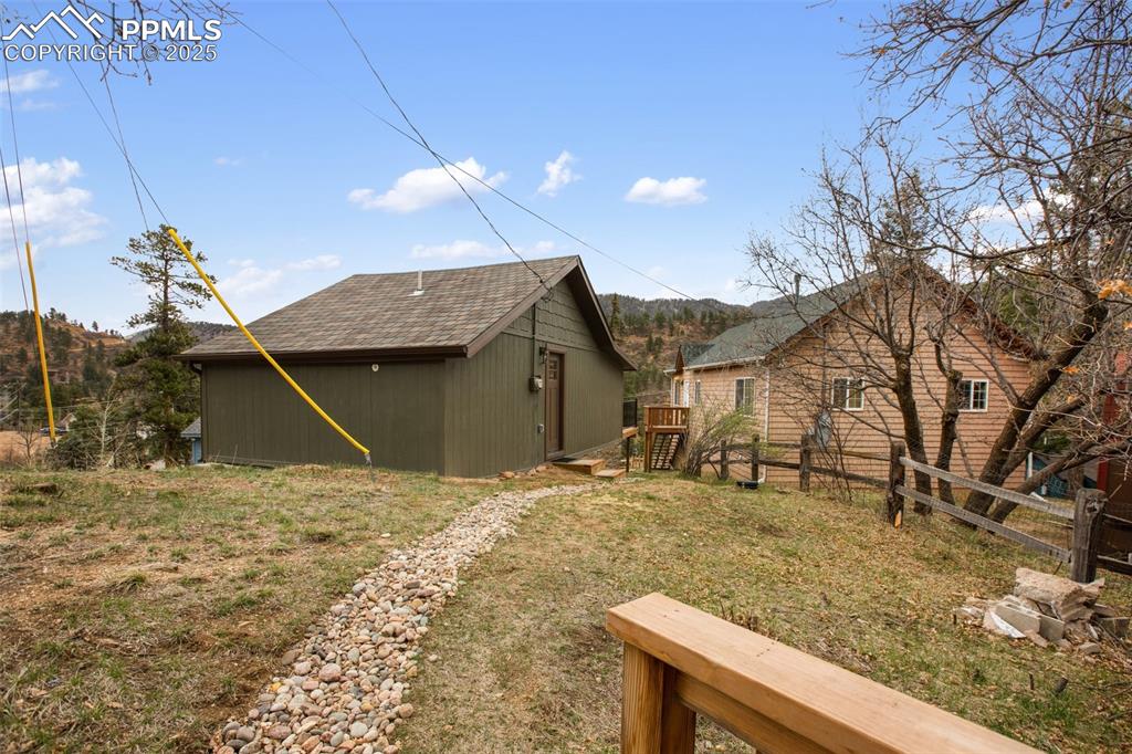 Image 27 of 50: stone walk way to cabin