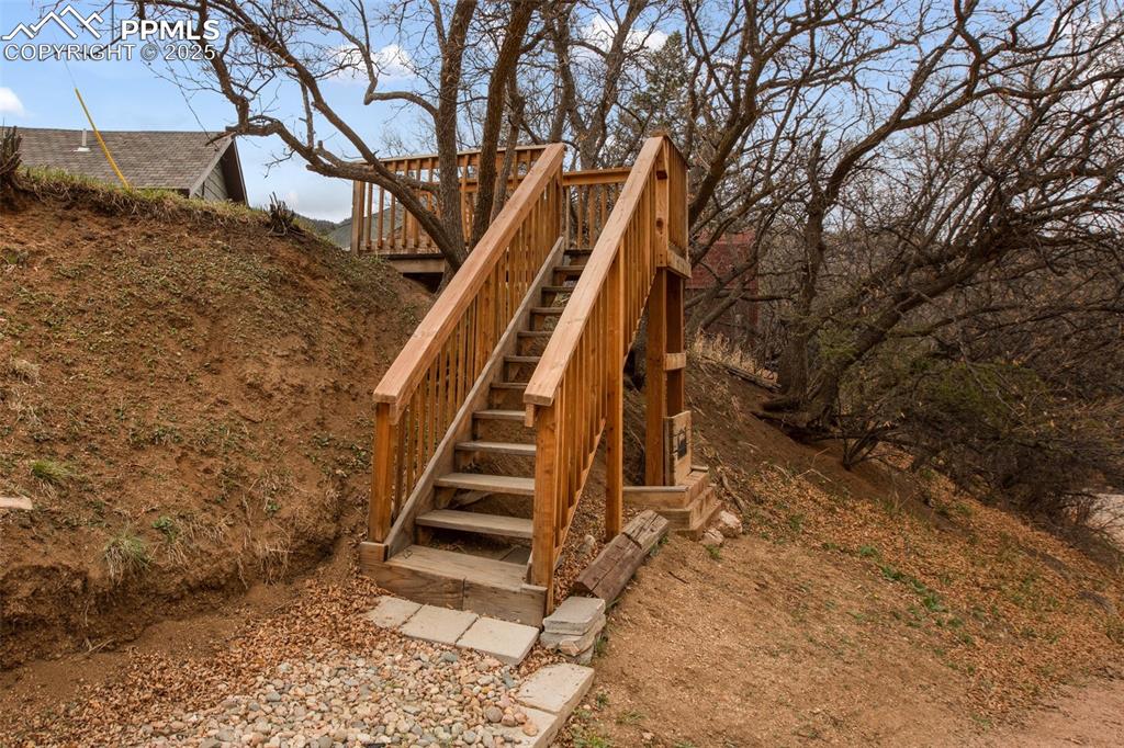 Image 42 of 50: Stairs to lot