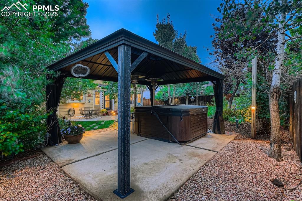 Image 28 of 28: Gazebo and hot tub stay with the home.