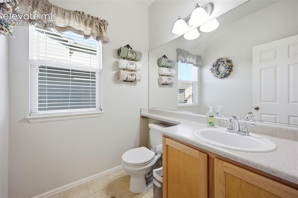 Image 15 of 42: Main level half bath