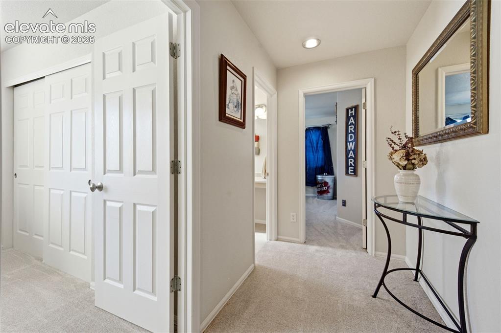 Image 17 of 42: Hallway to 2nd and 3rd bedrooms
