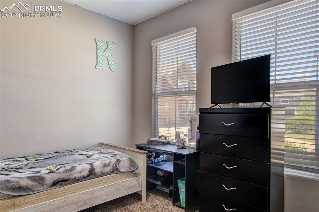 Image 19 of 21: View of carpeted bedroom