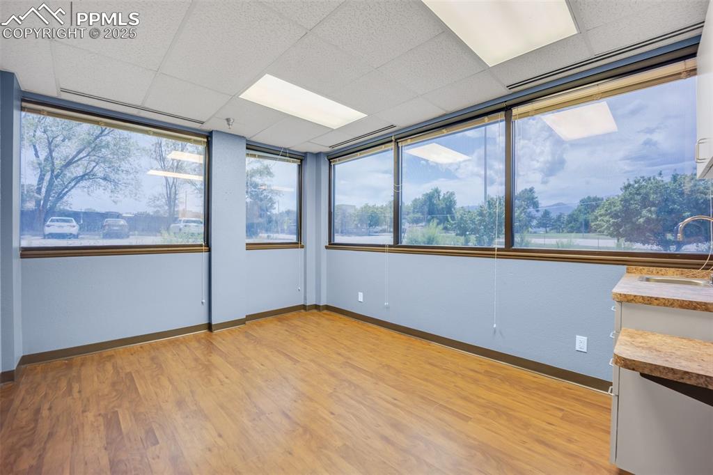 Image 22 of 49: Unfurnished room with light wood-style flooring, healthy amount of natural