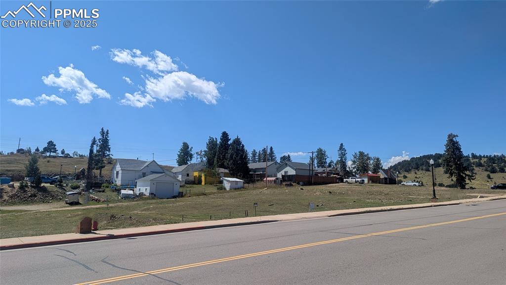 Image 9 of 9: City utilities available, paved streets, sidewalks and street lights