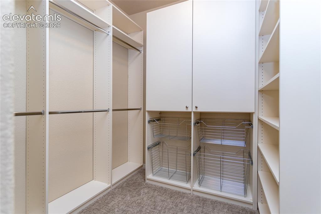 Image 24 of 49: Walk-In Closets