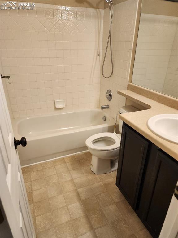 Image 16 of 17: Full bathroom with shower / bathtub combination and vanity