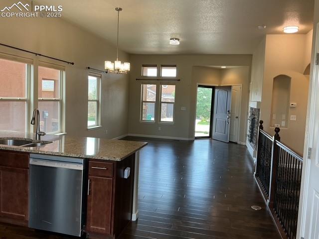 Image 11 of 37: Looking from kitchen to Dinning & Living area