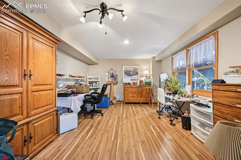 Image 27 of 50: Sunlit Office in the Walk-out Basement