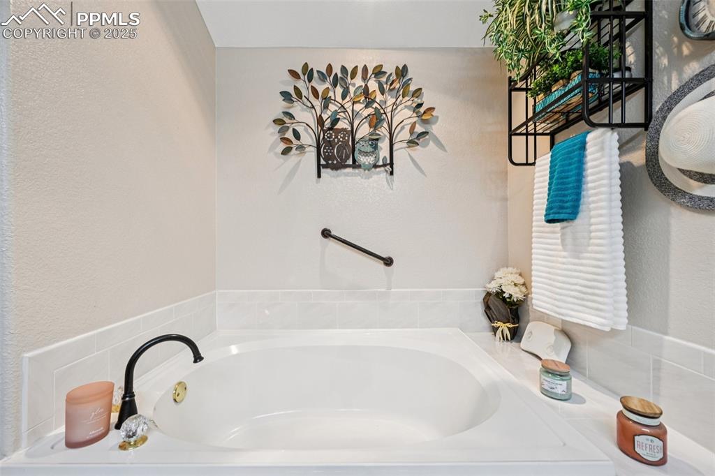 Image 32 of 50: Soaking Tub in Primary BAth
