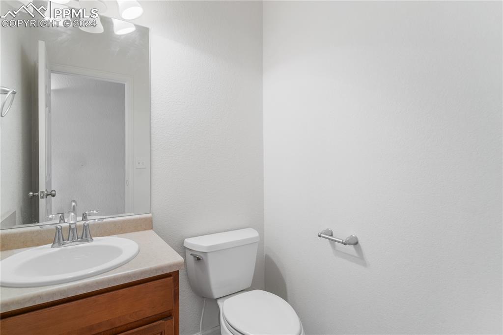 Image 14 of 30: Bathroom featuring toilet and vanity