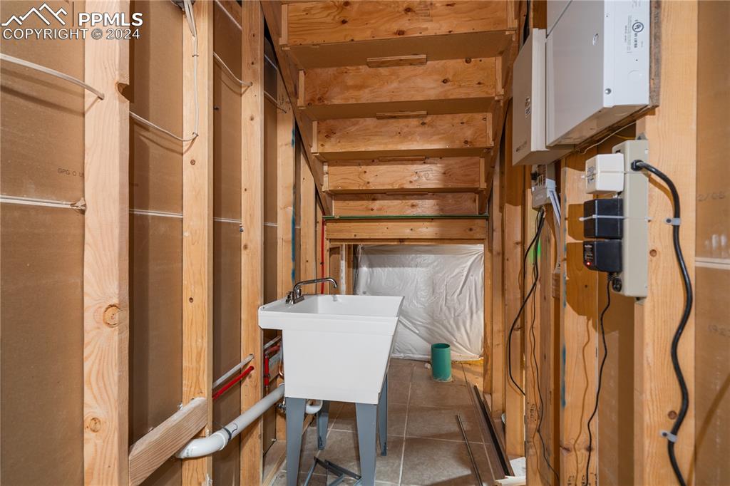 Image 21 of 30: Basement with tile floors