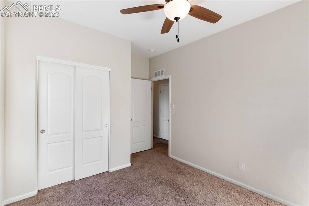 Image 32 of 38: Bedroom