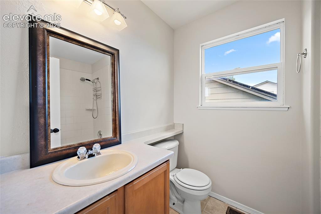 Image 26 of 49: Upper level bathroom