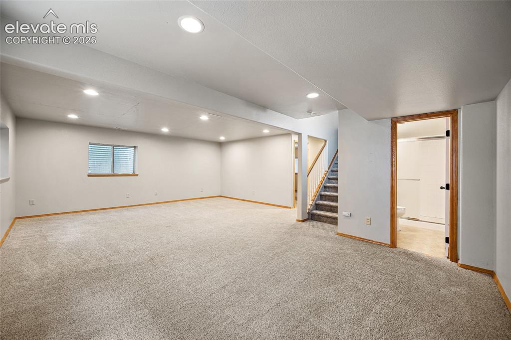 Image 32 of 49: Extra living area in basement