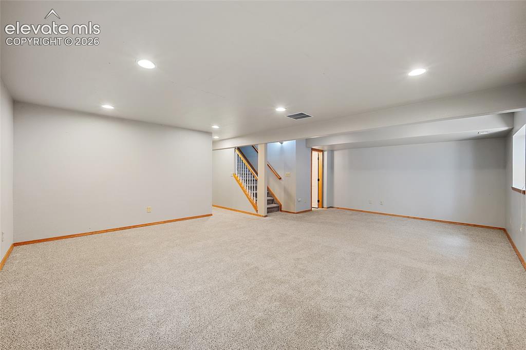 Image 33 of 49: Extra living area in basement