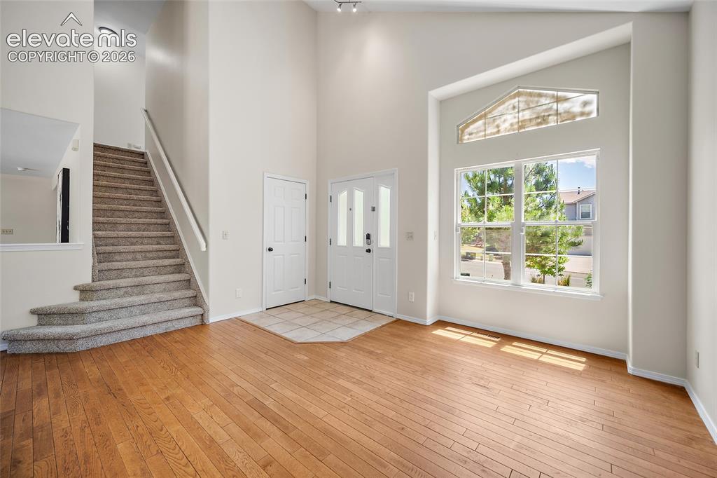 Image 6 of 49: Front flex room/ entry