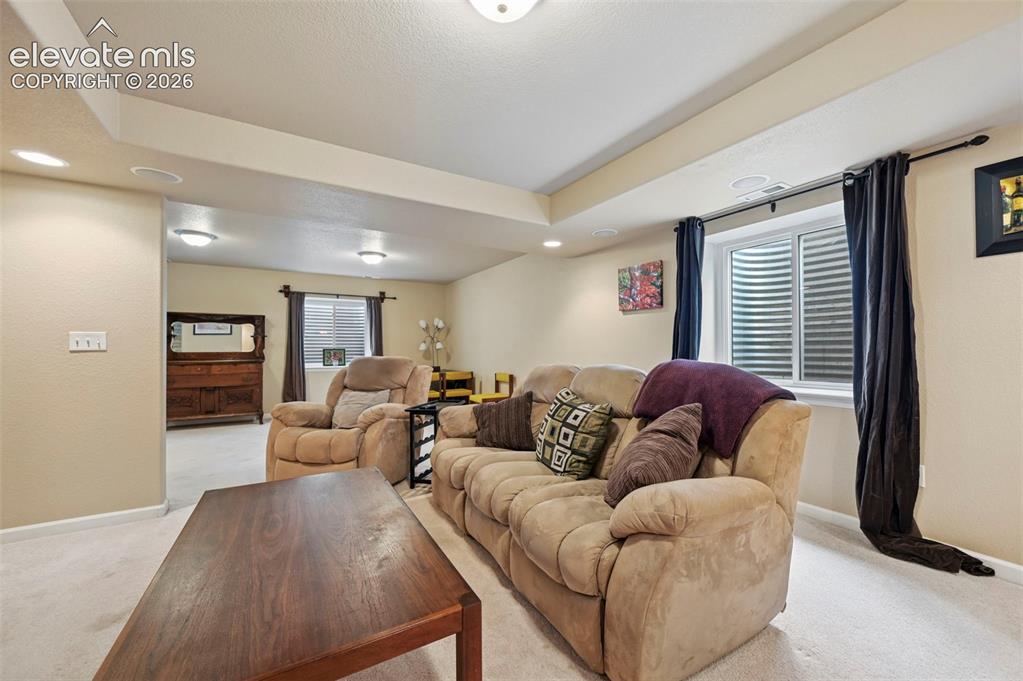 Image 10 of 33: Carpeted recreation room featuring recessed lighting, a built-in ceiling sp