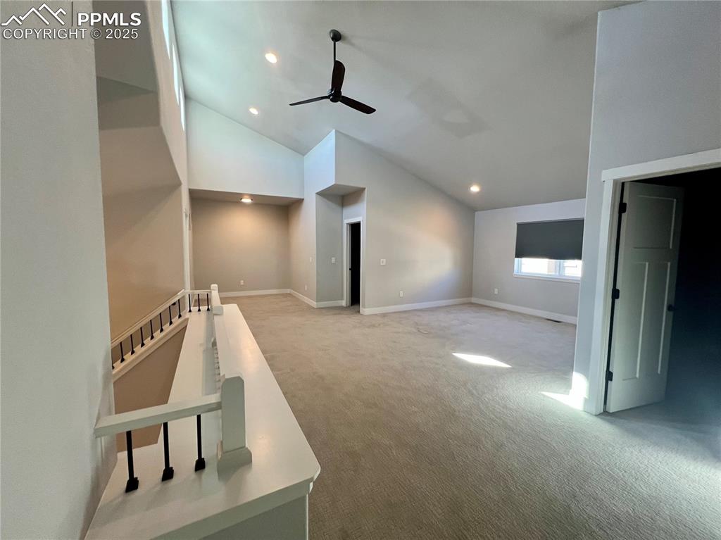 Image 10 of 19: Bonus room featuring carpet flooring, a ceiling fan, recessed lighting, and