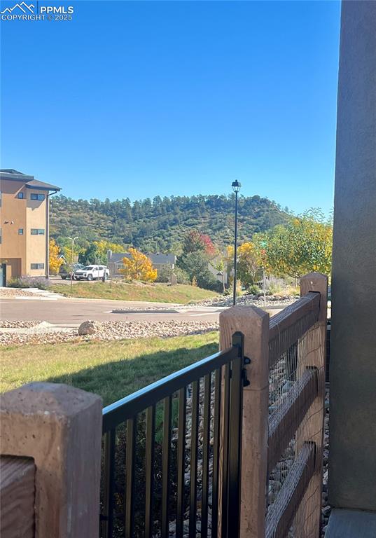 Image 16 of 19: Balcony with a mountain view