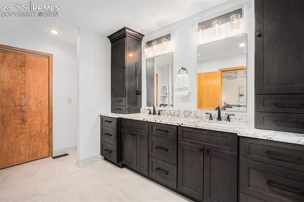 Image 23 of 49: Enjoy the gorgeous remodeled en-suite bathroom, oversized walk-in shower an