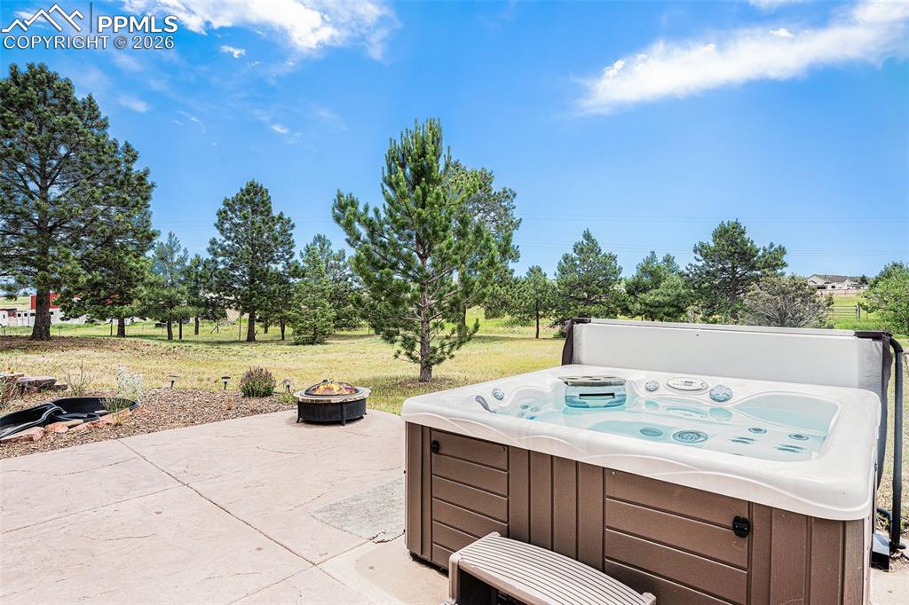 Image 32 of 49: Step outside and enjoy the best of Colorado living on your stamped concrete