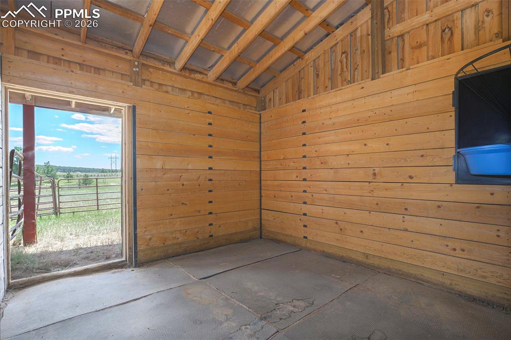 Image 40 of 49: 2- 12 X 12 stalls with rubber mats and 
swing out combo feeder for grain a