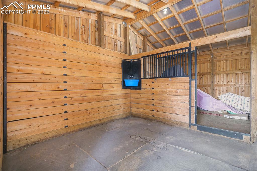 Image 41 of 49: 2- 12 X 12 stalls with rubber mats and 
swing out combo feeder for grain a