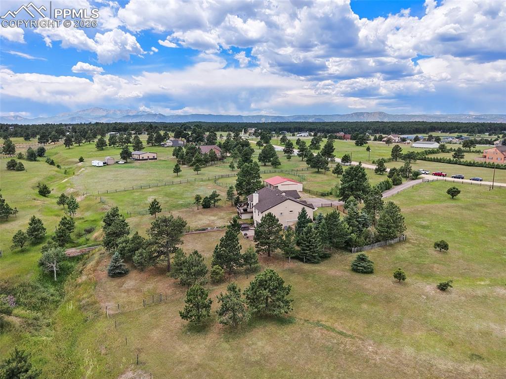 Image 44 of 49: Located in a quiet equestrian-friendly community within minutes of Monument