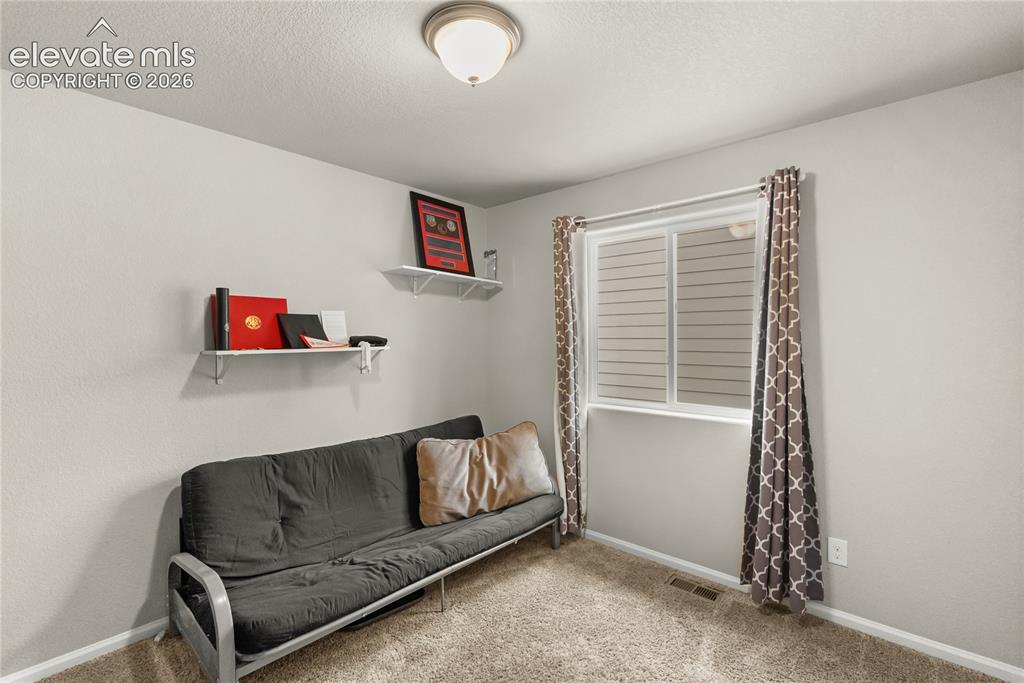 Image 12 of 34: Upstairs Bedroom