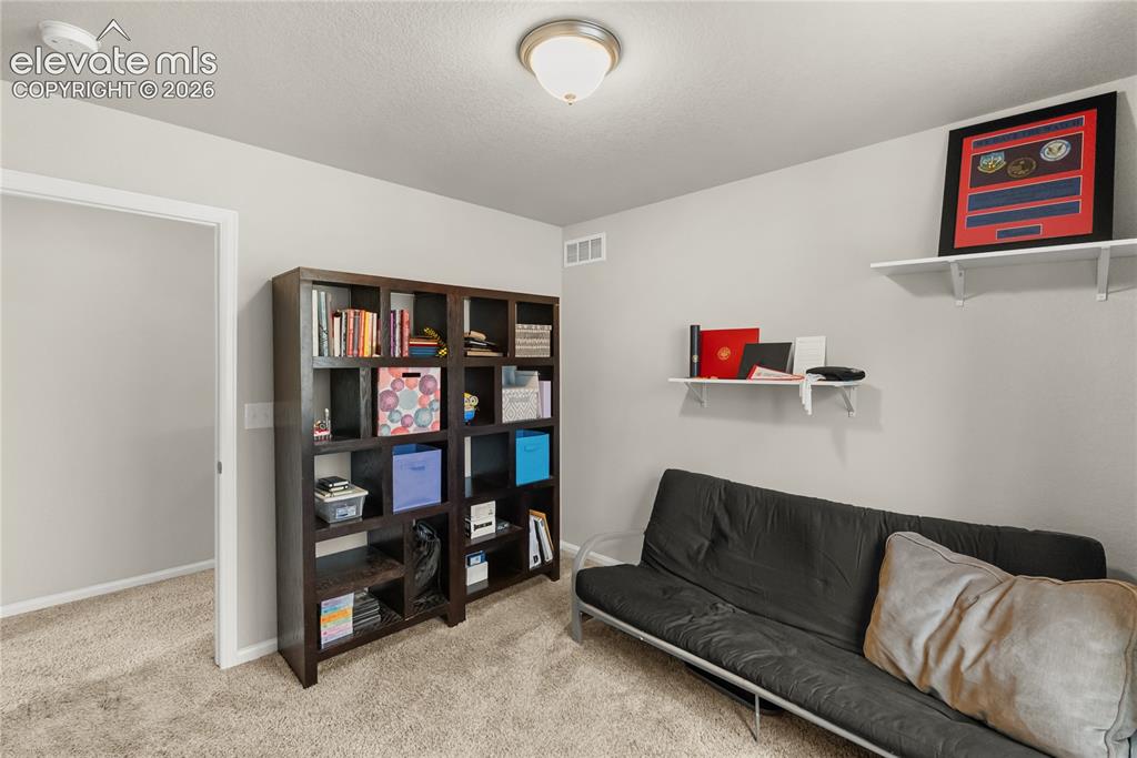 Image 13 of 34: Upstairs bedroom